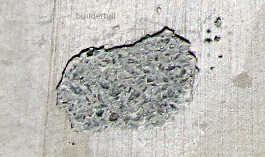 a blister on a concrete slab.