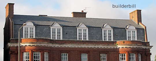 a gambrel roof with dormer windows.