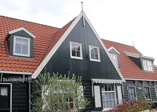 two gable dormers and a shed dormer