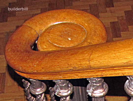 a hardwood stair volute