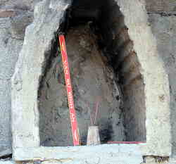 joss sticks in small shrine