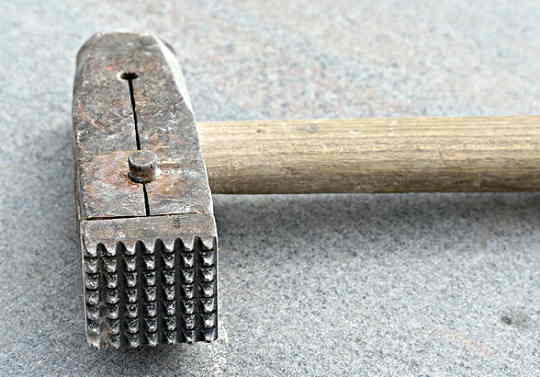 a stone mason's hand hammer