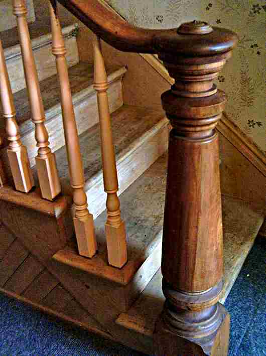 A timber newel post