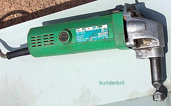 Cutting metal deals roofing with nibbler
