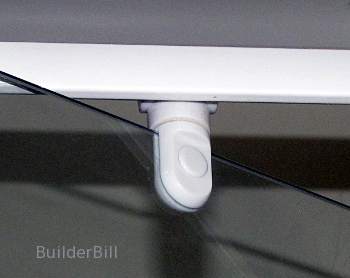 A shower screen door hinge.