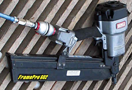 A Senco air nail gun