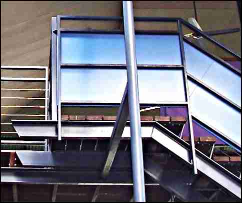 top landing of a steel stair to a deck