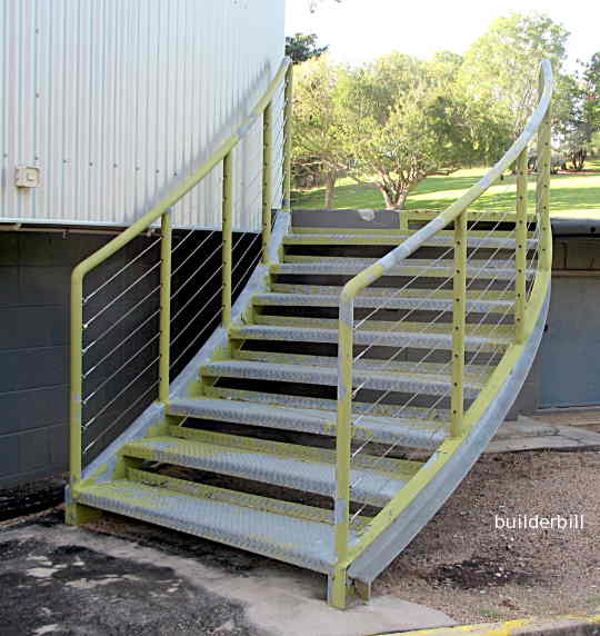 a flight of curved steel stairs