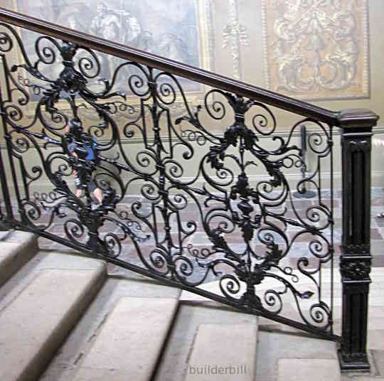 a fine wrought iron balustrade to a stair