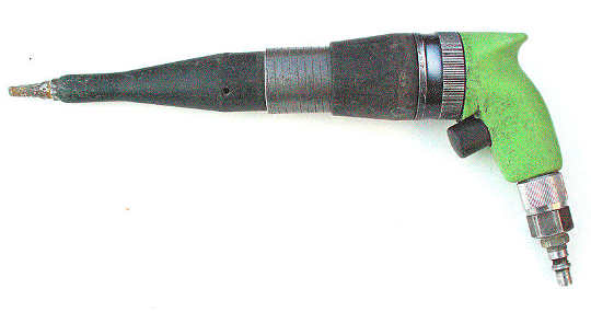 A small pneumatic chipping hammer