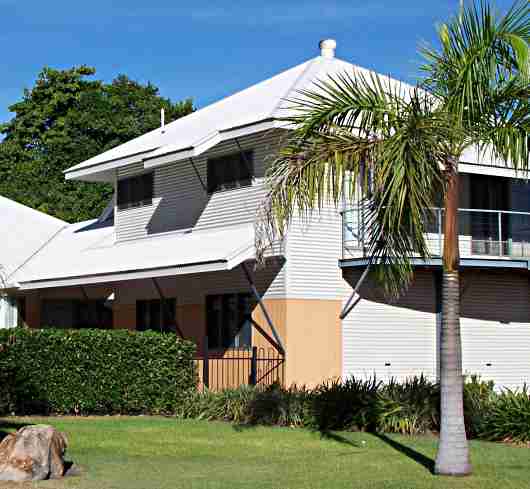 corrugated siding to upper floor