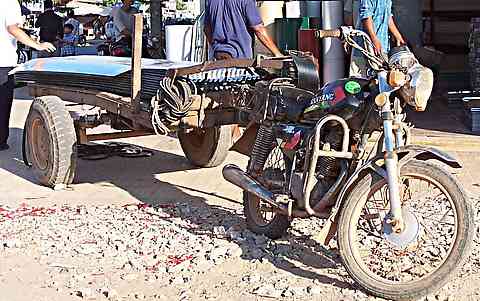 motorbike roofing transport in Cambodia