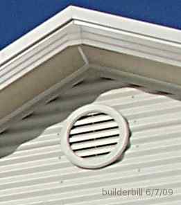 A small plastic gable vent