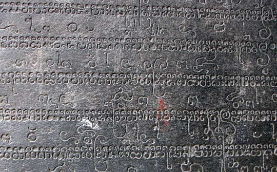 door reveal with sanskrit carving