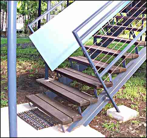 bottom of a steel stair to an outside deck